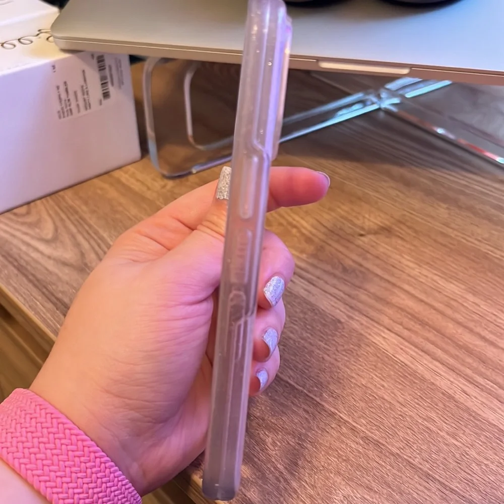 iPhone 13 Pro Otterbox with mag safe charging ring.